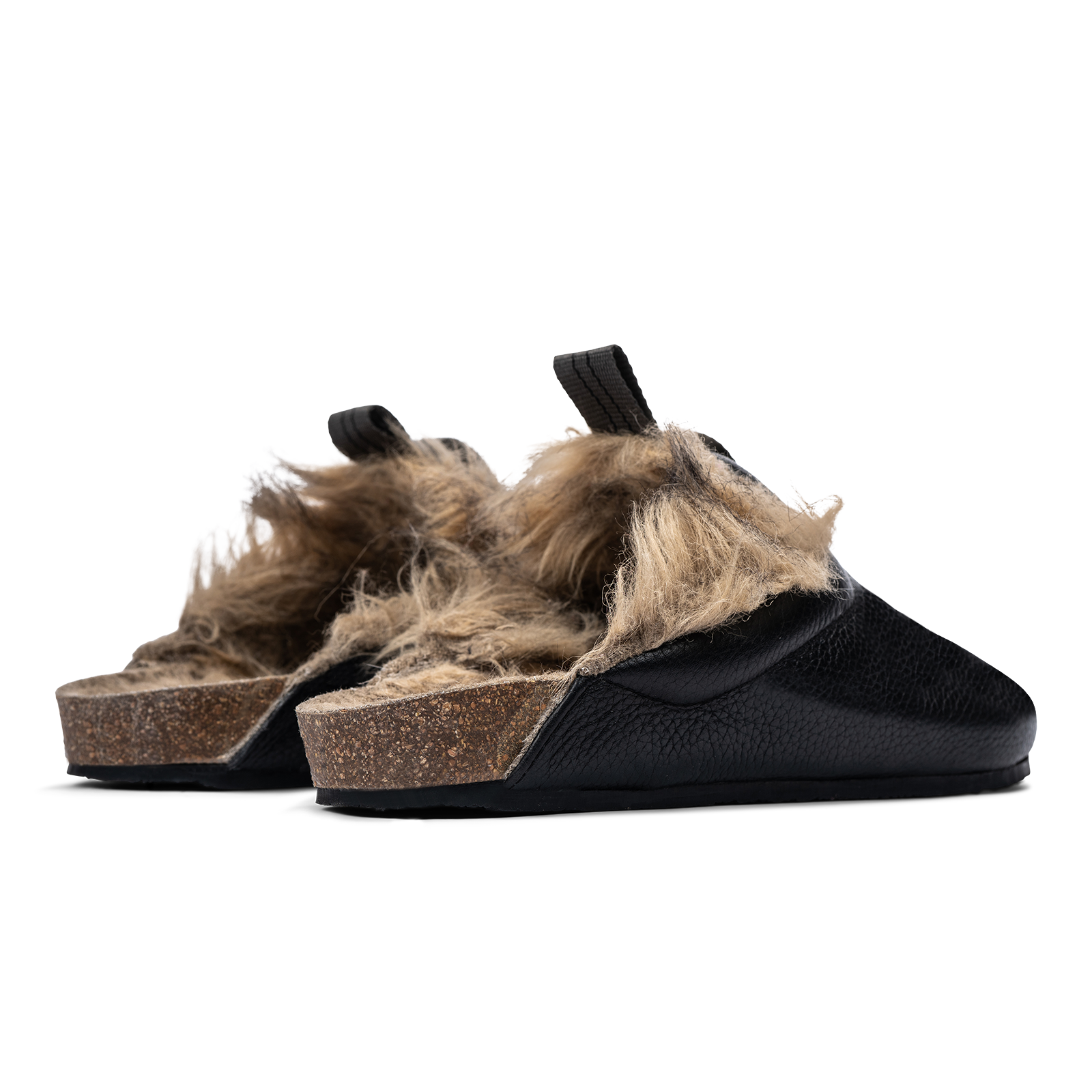 Back 3/4 view  Bantha Himalya is a Mule with faux fur lining. - Black tumbled leather upper and vibram sheet rubber bottom.