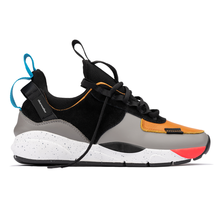 Profile shot, The Contera Kalahari is a Runner with grey leather black suede and tabaco orange leather, Blue webbing heel pull, Black webbin tongue pull, Black webbing lace system, painted eva midsole ande black rubber outsole. 