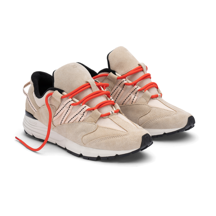 Altiutude / Safari front 3/4 view khaki suede / air mesh / webbing lace holder with orange lace on a vibram sole